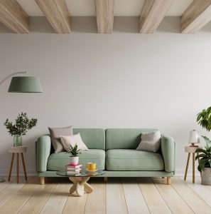 Green sofa in modern apartment interior with empty wall and wooden table,3D rendering